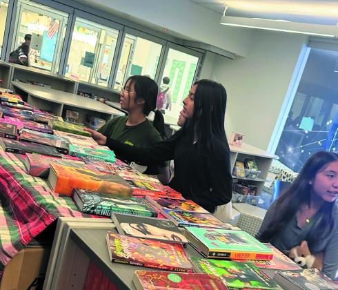 HELPING RELUCTANT READERS