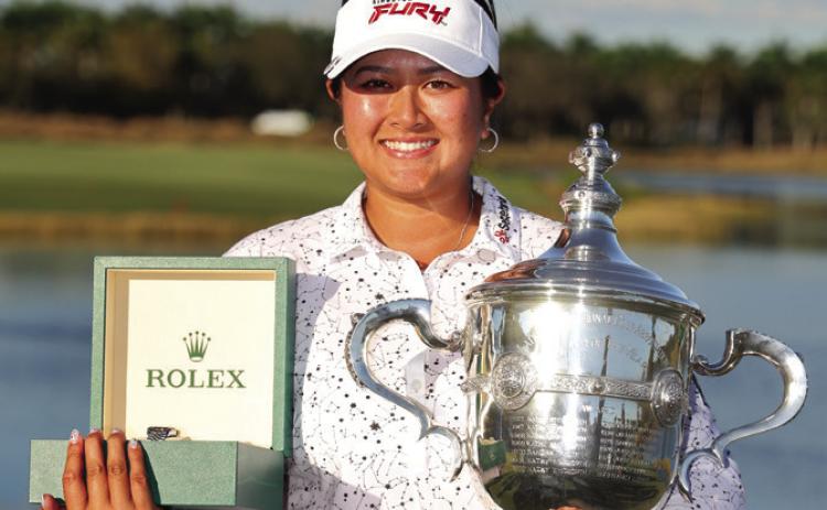 Lilia Vu poses with the Rolex Player of the Year trophy and her Rolex after the CME Group Tour Championship on November 19, 2023 in Naples, Florida Photo by Getty Images