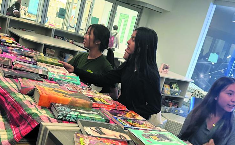 HELPING RELUCTANT READERS