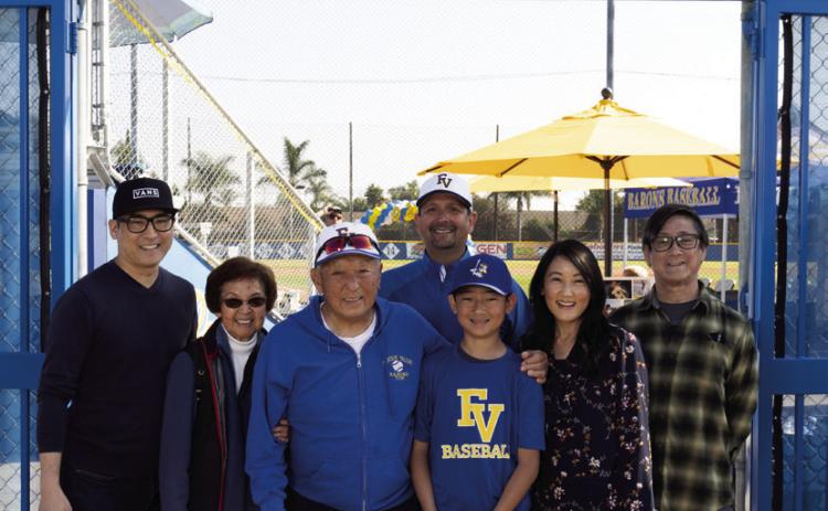 Tom with his family at the stadium. Photo by BLEU COTTON PHOTOGRAPHY