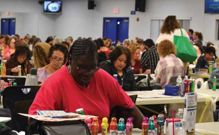 Players enjoy the weekly bingo games at FVHS. Photo by AVERY HOANG / Fountain V alley Living Magazine