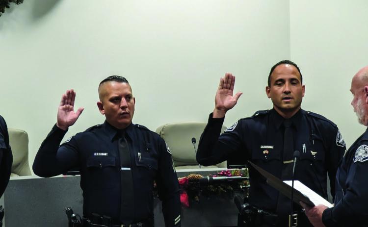 Chief Matt Sheppard conducts the promotions of Joe Zane, Isaac Marquez &amp; Sergio Rodriguez. Photo by VINCE SOSA / Fountain Valley Living Magazine