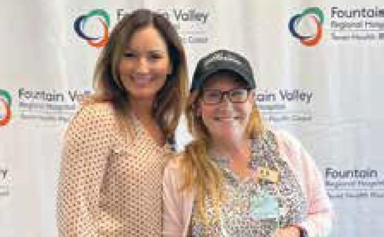 Adrienne Fielden, right, with Crystal Carlos, nurse manager, pediatrics/PICU/NICU. Photo provided