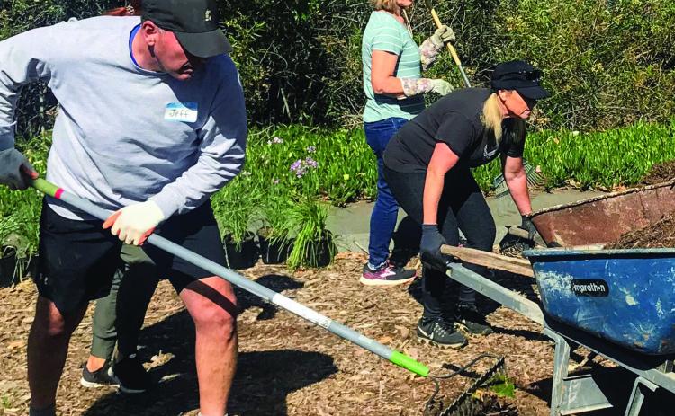 Volunteers helping improve our community in 2023.