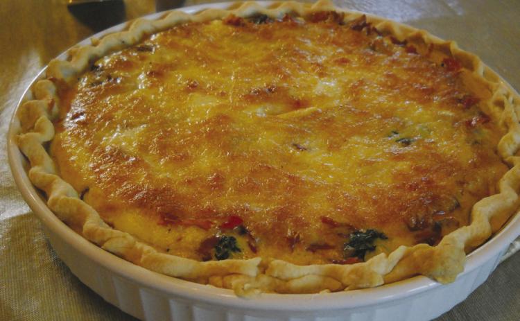 CARAMELIZED SHALLOT AND SPINACH QUICHE WITH PROSCIUTTO AND GRUYERE