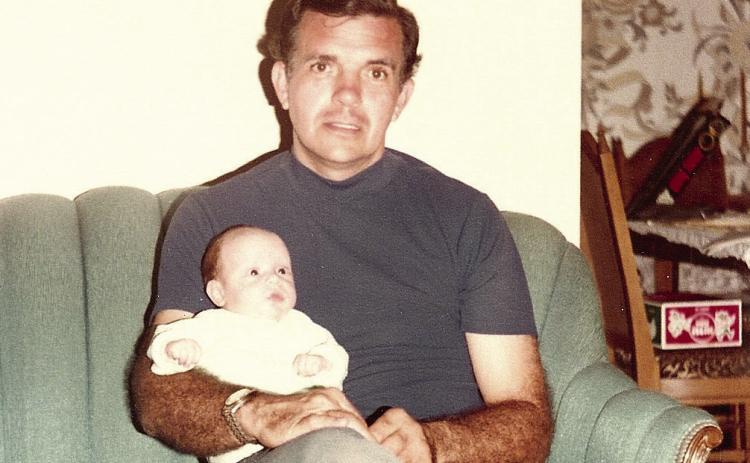 Scott on his father’s lap